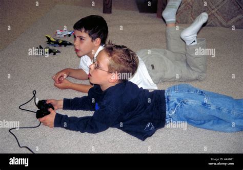 Boys playing Video Games Stock Photo - Alamy