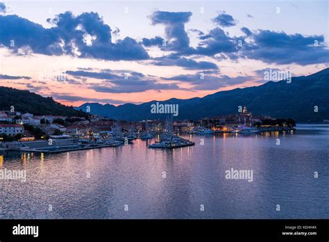 Scenic view of marina at sunset Stock Photo - Alamy