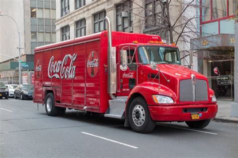 Typical Coca Cola red truck near the new luxury condos in Boston ...