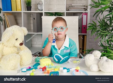 Boy Down Syndrome Table Toys Child Stock Photo 2235552893 | Shutterstock