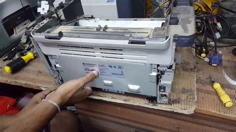 Fixing a paper jam in hp 1005 mfp printer - YouTube