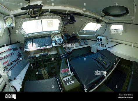 Interior of a new armoured personnel carrier seats, wheel, dashboard. October 15, 2021. Kyiv ...