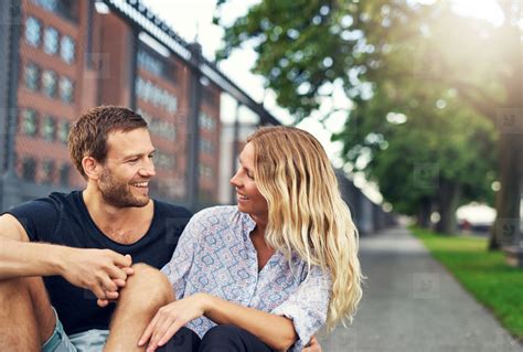 Couple laughing at each other stock photo (139732) - YouWorkForThem