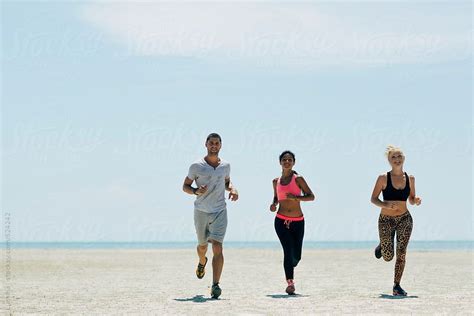 Group Of People Jogging On The Beach by Lumina | Beach, Jogging, Tropical beach