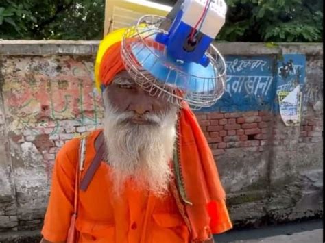 Watch: Video of A Baba Having Solar Panel And A Fan On His Head Left ...