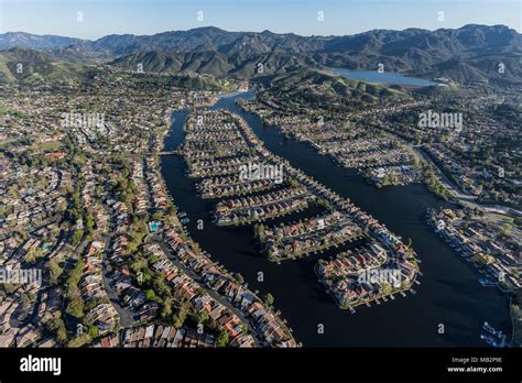 Aerial view of lake front homes around Westlake Island in the Thousand ...