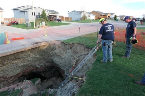 Cavers in the Black Hills explore the sinkhole in Black Hawk | KELOLAND.com