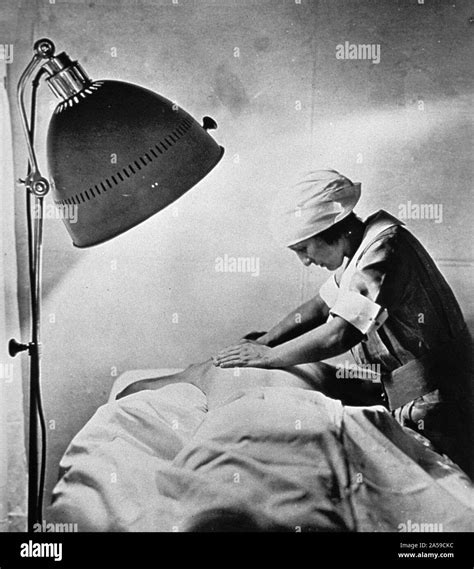Nurse conducting heat treatment hi-res stock photography and images - Alamy