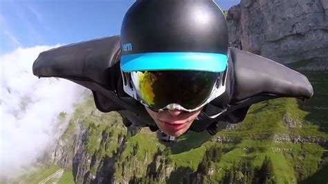 Unbelievable GoPro video shows man in wingsuit flying over Swiss ...