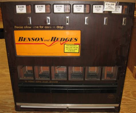 1980's cigarette vending machine for Benson & Hedges, six drawers in a wooden case - 32.5" x 34.5