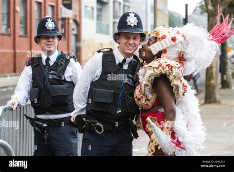 Notting hill carnival police dancing hi-res stock photography and images - Alamy