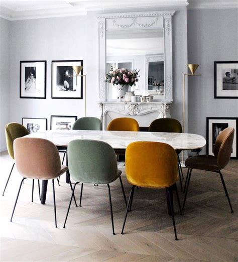 Different colored chairs accenting this dining space I Décor Aid #ChairComedores | Scandinavian ...