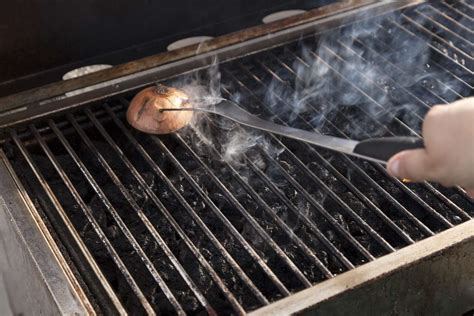 Why You Should Use An Onion To Clean Your Grill