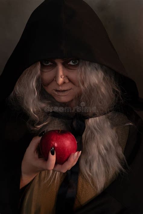 Stepmother Witch Gives Poisoned Red Apple.Woman As Witch in Black ...