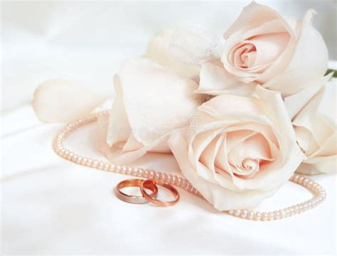 Wedding Rings And Roses Royalty Free Stock Photos - Image: 12522178