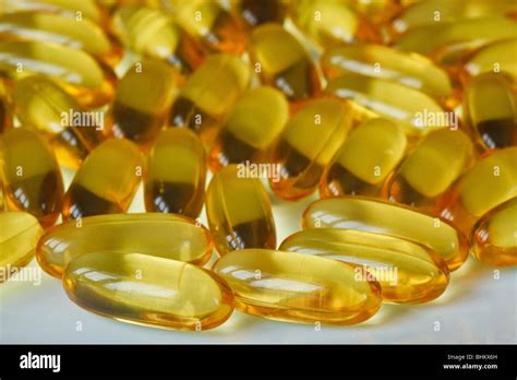 Close-up image of salmon oil capsules Stock Photo - Alamy