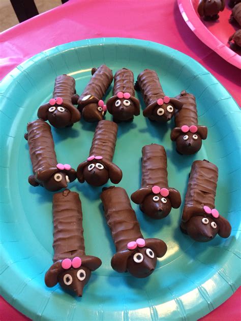 We made these chocolate dachshunds for my friend's dachshund themed baby shower. Adorable ...