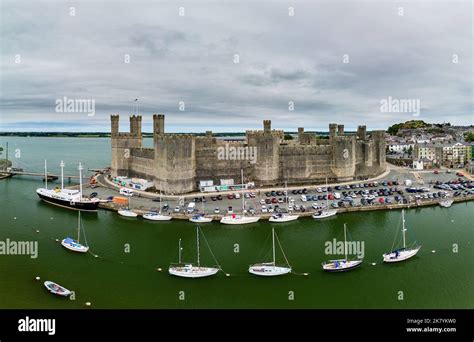 Aerial view of the ancient Caernarfon Castle in North Wales Stock Photo ...