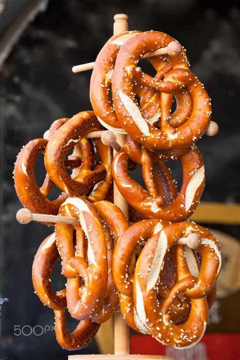 Pretzels on the wooden stand / 500px | Wooden stand, May weddings, Wooden