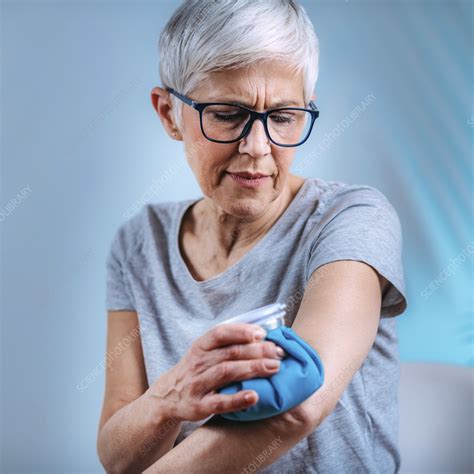 Elbow pain treatment - Stock Image - F036/5416 - Science Photo Library