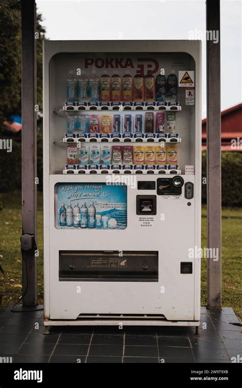 Singapore - July 9 2023: Close Up of Pokka Vending Machine Stock Photo - Alamy