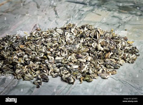 Pu-erh fermented Chinese tea in a roll Stock Photo - Alamy