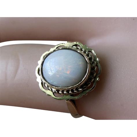 Vintage European 9K Oval Opal Ring from gloriousestatetreasures on Ruby Lane