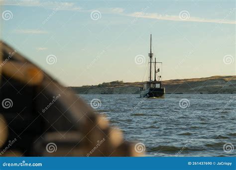 Pirate Ship Sailing at Sunset in the Sea. Wooden Boat Traveling on ...