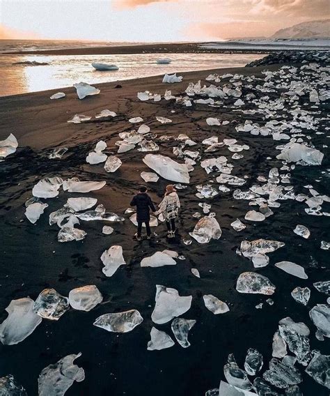 Huge chucks of glistening ice spread across black volcano sand - Iceland's stunning Diamond ...