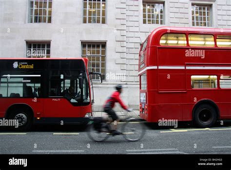 Double decker and bendy buses hi-res stock photography and images - Alamy