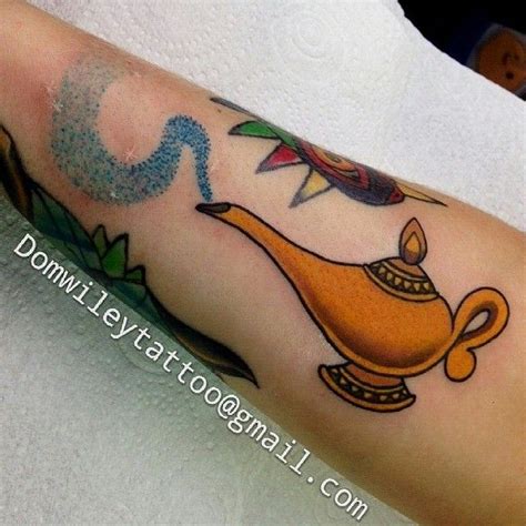 Image result for aladdin tattoo | Aladdin tattoo, Lamp tattoo, Disney sleeve tattoos