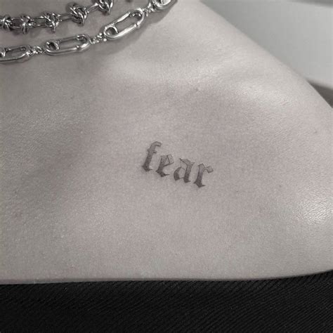 Fear tattoo on Demi Lovato.