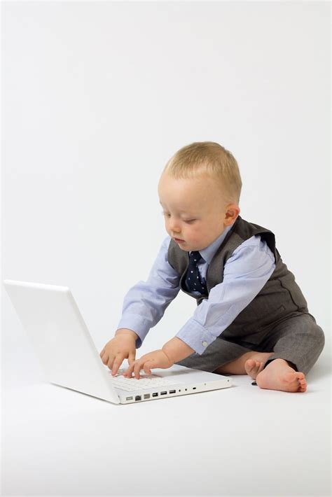Baby Boy Typing | A cute baby boy is dressed in smart busine… | Flickr