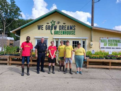 Police Chief Fleury Delvers Donuts to Greenhouse