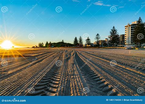 Intense Sunrise at Mount Maunganui Stock Photo - Image of main, flare ...