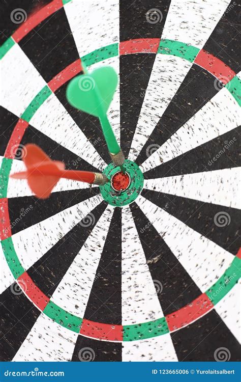 Darts Game with a Dart in the Target Center Stock Photo - Image of ...