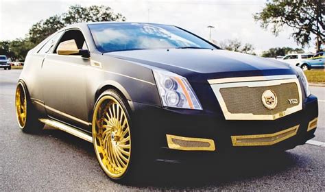 Ace-1: Matte Black Cadillac CTS Coupe on Gold 26"s FS02 Asantis