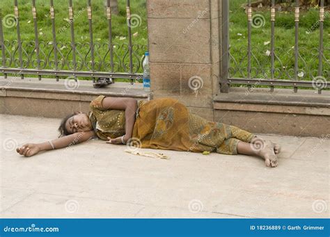 Homeless Woman Lying On Ground Editorial Image | CartoonDealer.com #177625328