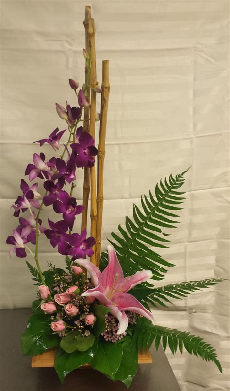 Breathtaking contemporary arrangement of dendrobium orchids, spray ...