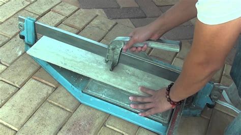 How to Cut Porcelain Tiles With a Tile Cutter - YouTube