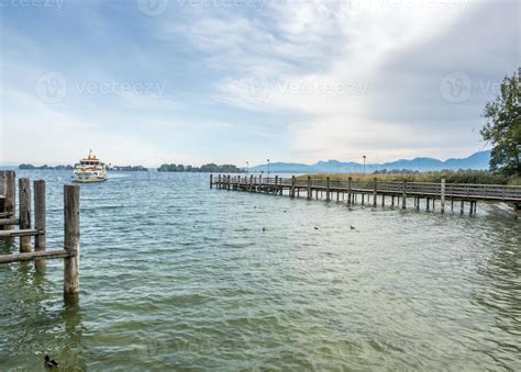 Pier for ship to Herrenchiemsee palace 10330349 Stock Photo at Vecteezy