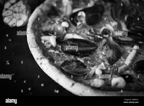 delicious italian pizza with fresh seafood Stock Photo - Alamy