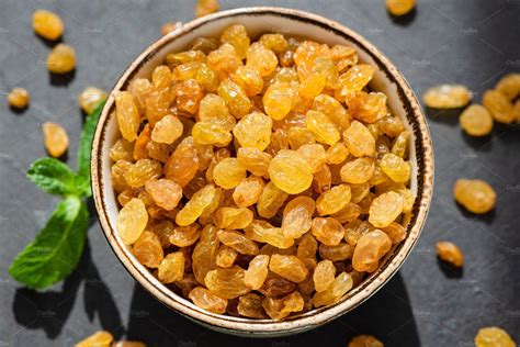 Golden Raisins In Bowl Closeup | Food, Raisin recipes, Golden raisins