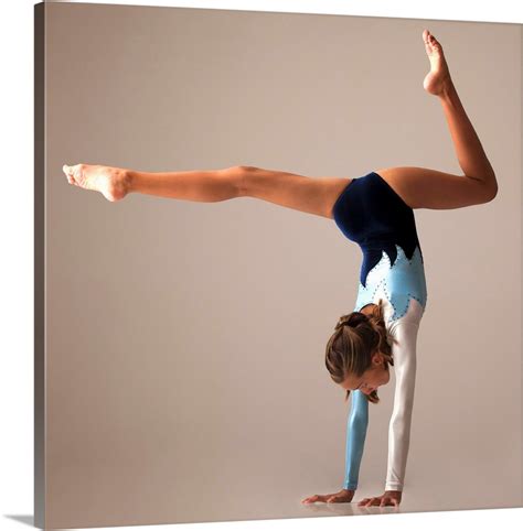 Female gymnast performing handstand Wall Art, Canvas Prints, Framed ...