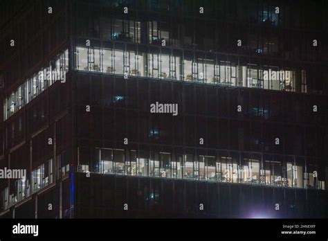 Office building with glass facade - night photograph Stock Photo - Alamy