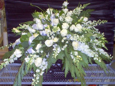 Casket spray white Roses, Snaps, Stock | Funeral Flowers | Pinterest | Funeral flowers, Sympathy ...