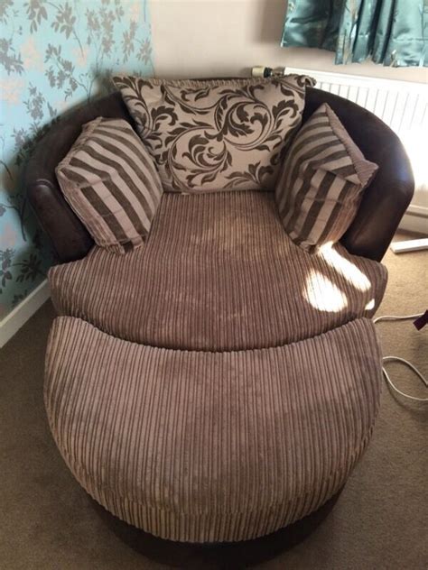 Swivel cuddle chair and footstool | in Cupar, Fife | Gumtree