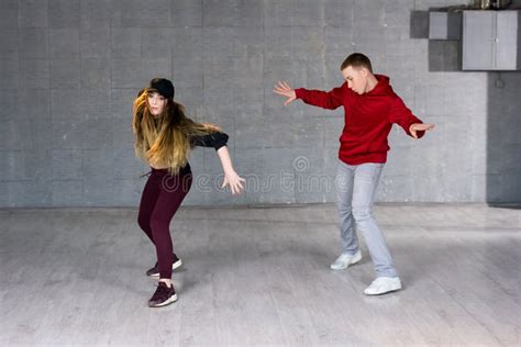 Attractive Casual Couple Dancing Hip-hop. Stock Photo - Image of ...