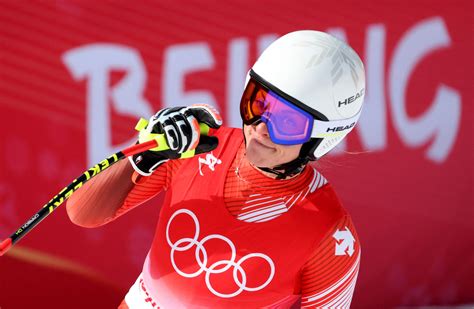 Alpine skiing-Switzerland's Gut-Behrami wins gold in super-G | Reuters