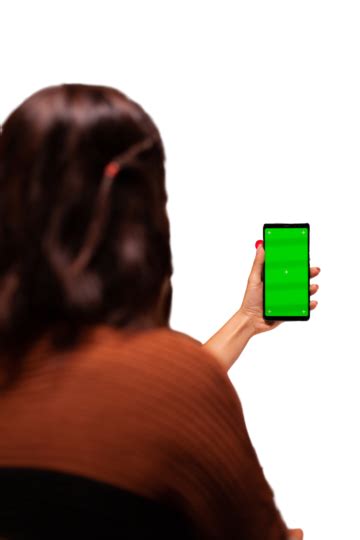 Young Woman Holding Smartphone With Green Screen Indoors Winter View, Christmas, Adult, Gift PNG ...